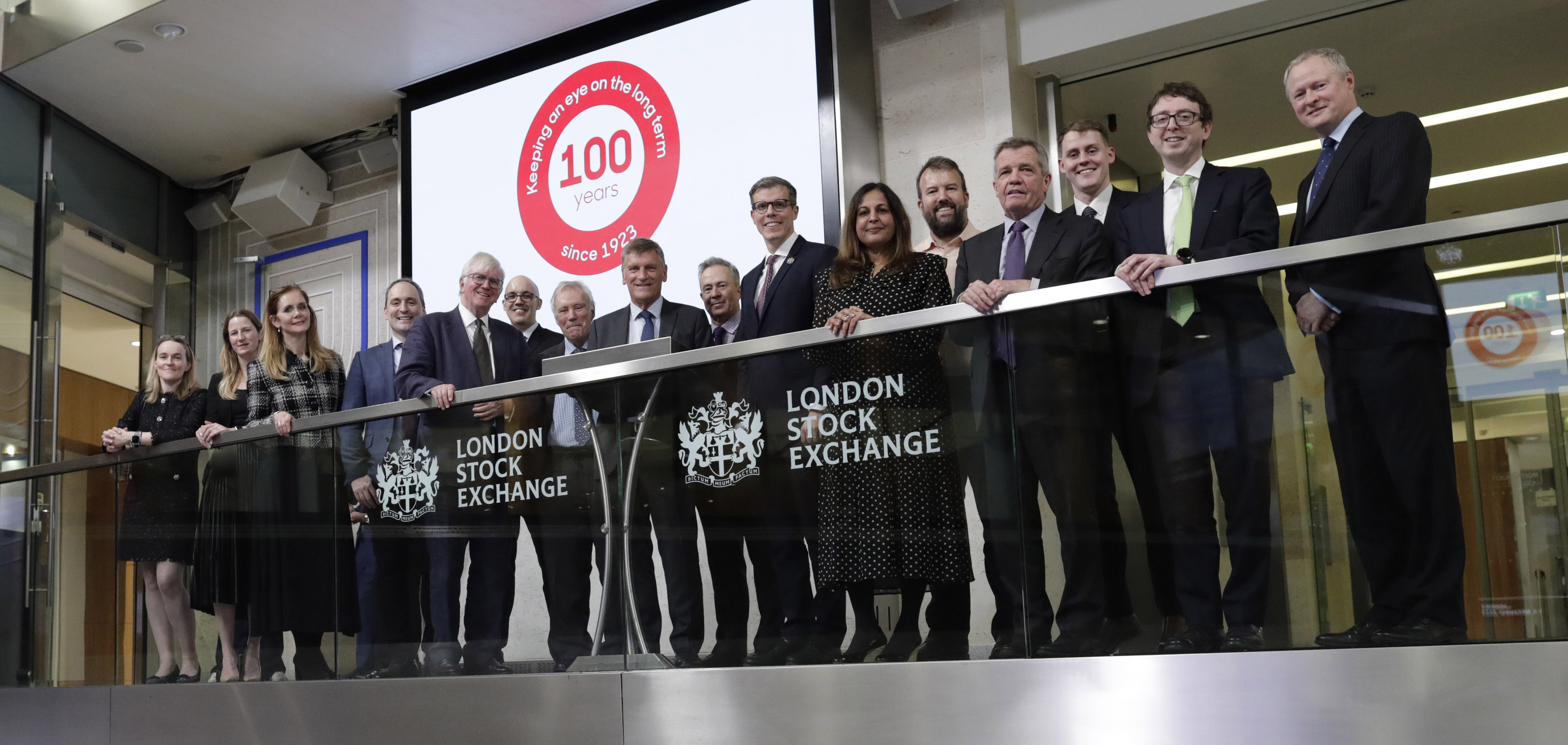 Board members standing on the balcony at the London Stock Exchange