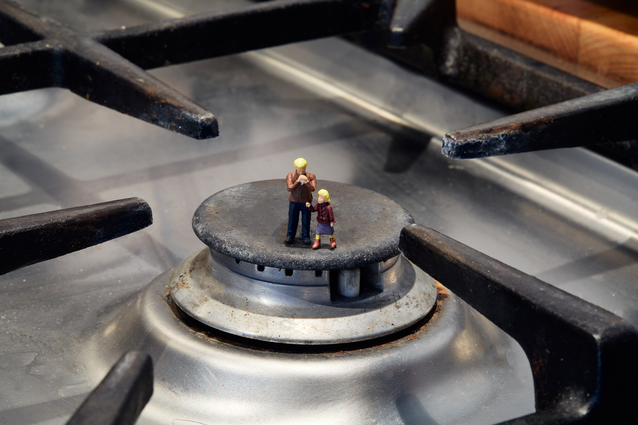 Small figurines on oven hob